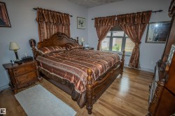 Bedroom with wood finished floors - 