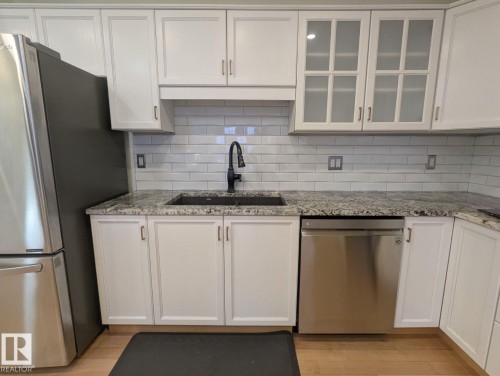7540 137A Avenue, Edmonton, AB - Indoor Photo Showing Kitchen With Stainless Steel Kitchen With Upgraded Kitchen