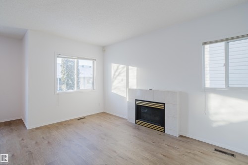 57 843 Youville Drive W, Edmonton, AB - Indoor With Fireplace