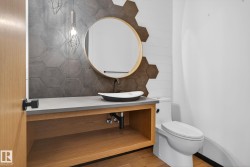 Bathroom featuring vanity and wood finished floors - 