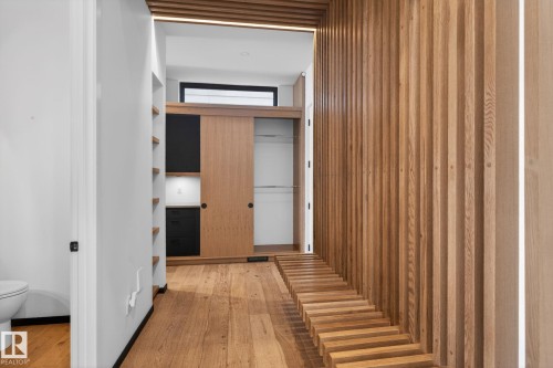 Hallway with light wood-type flooring - 104 Edgewater Circle, Leduc, AB - Indoor Photo Showing Other Room