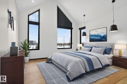 Bedroom with high vaulted ceiling and light wood-style flooring - 