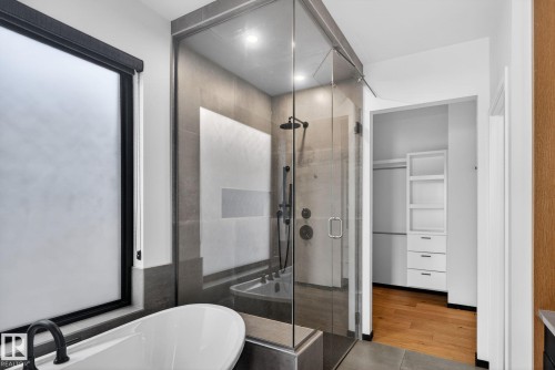 Full bathroom with a soaking tub and a shower stall - 104 Edgewater Circle, Leduc, AB - Indoor Photo Showing Bathroom