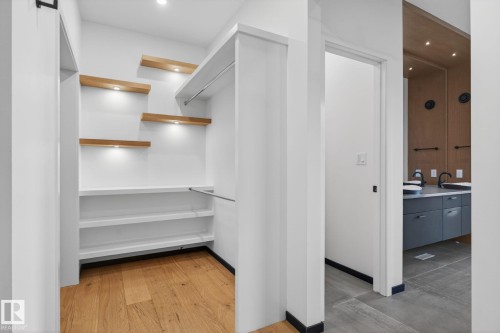 Spacious closet with a sink - 104 Edgewater Circle, Leduc, AB - Indoor Photo Showing Other Room