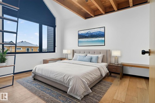 Bedroom featuring light wood finished floors and wood ceiling - 104 Edgewater Circle, Leduc, AB - Indoor Photo Showing Bedroom