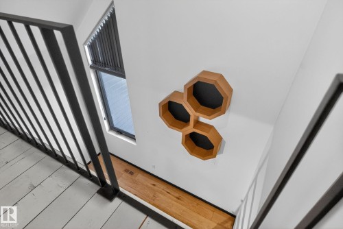 Detailed view of wood finished floors - 104 Edgewater Circle, Leduc, AB - Indoor Photo Showing Other Room