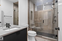 Full bath with vanity and a shower stall - 