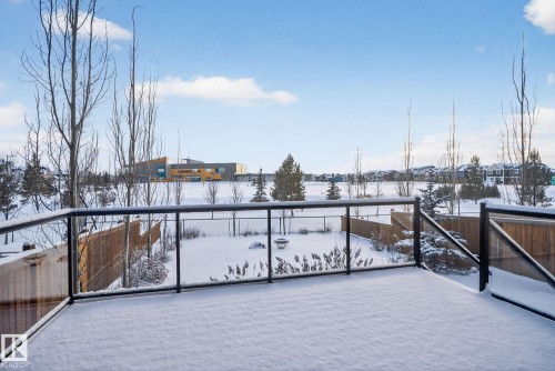 View of snow covered back of property - 104 Edgewater Circle, Leduc, AB - Outdoor