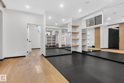 Community lobby with recessed lighting - 104 Edgewater Circle, Leduc, AB - Indoor Photo Showing Other Room
