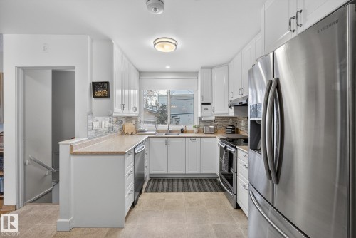 6819 83 Avenue, Edmonton, AB - Indoor Photo Showing Kitchen With Stainless Steel Kitchen With Double Sink With Upgraded Kitchen