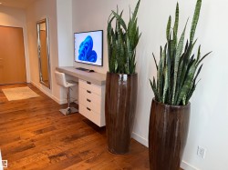 Office featuring baseboards and dark wood-style floors - 