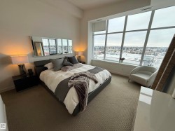 Bedroom featuring carpet floors and baseboards - 