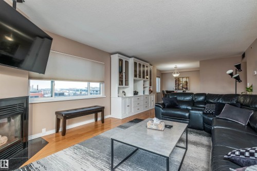 1105 10130 114 Street, Edmonton, AB - Indoor Photo Showing Living Room With Fireplace