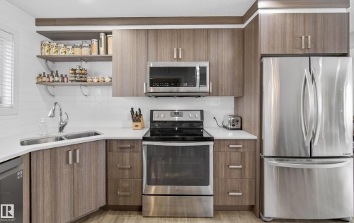 5604 91 Avenue, Edmonton, AB - Indoor Photo Showing Kitchen With Double Sink