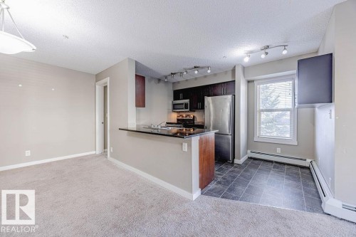 202 5816 Mullen Place, Edmonton, AB - Indoor Photo Showing Kitchen