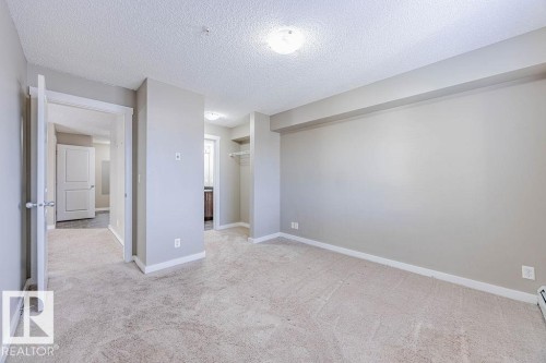 202 5816 Mullen Place, Edmonton, AB - Indoor Photo Showing Other Room