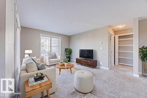 202 5816 Mullen Place, Edmonton, AB - Indoor Photo Showing Living Room