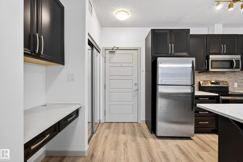 318 1144 Adamson Drive, Edmonton, AB - Indoor Photo Showing Kitchen With Stainless Steel Kitchen