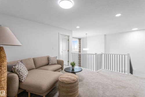 20976 22 Avenue, Edmonton, AB - Indoor Photo Showing Living Room