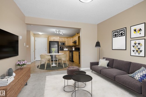 103 11935 106 St, Edmonton, AB - Indoor Photo Showing Living Room
