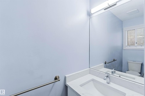 Half bathroom with vanity and toilet - 115 Deer Ridge Drive, St. Albert, AB - Indoor Photo Showing Bathroom