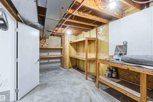 Unfinished below grade area with a workshop area - 115 Deer Ridge Drive, St. Albert, AB - Indoor Photo Showing Basement