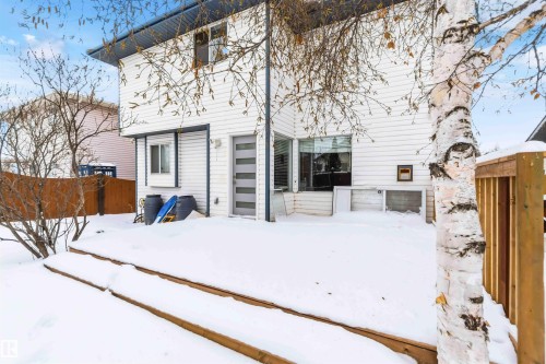 Snow covered house with a wooden deck - 115 Deer Ridge Drive, St. Albert, AB - Outdoor