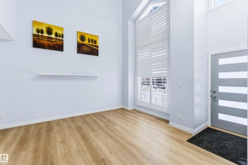 Foyer with light wood-type flooring and baseboards - 115 Deer Ridge Drive, St. Albert, AB - Indoor Photo Showing Other Room
