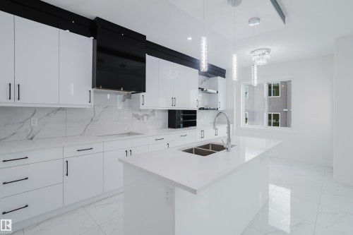 933 19 Avenue, Edmonton, AB - Indoor Photo Showing Kitchen With Double Sink