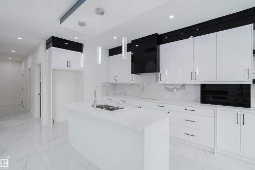 933 19 Avenue, Edmonton, AB - Indoor Photo Showing Kitchen With Double Sink