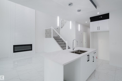 933 19 Avenue, Edmonton, AB - Indoor Photo Showing Kitchen With Double Sink