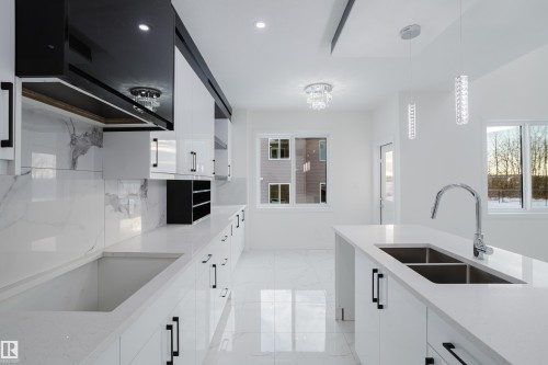 933 19 Avenue, Edmonton, AB - Indoor Photo Showing Kitchen With Double Sink