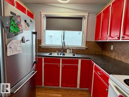 1307 36 Street, Edmonton, AB - Indoor Photo Showing Kitchen With Double Sink