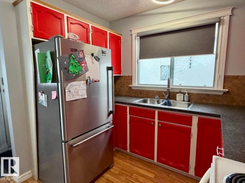 1307 36 Street, Edmonton, AB - Indoor Photo Showing Kitchen With Double Sink