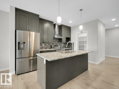 6412 167A Avenue, Edmonton, AB - Indoor Photo Showing Kitchen With Upgraded Kitchen