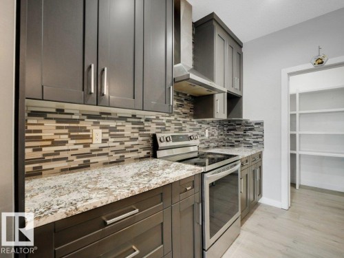 6412 167A Avenue, Edmonton, AB - Indoor Photo Showing Kitchen With Upgraded Kitchen
