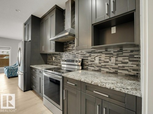6412 167A Avenue, Edmonton, AB - Indoor Photo Showing Kitchen With Upgraded Kitchen
