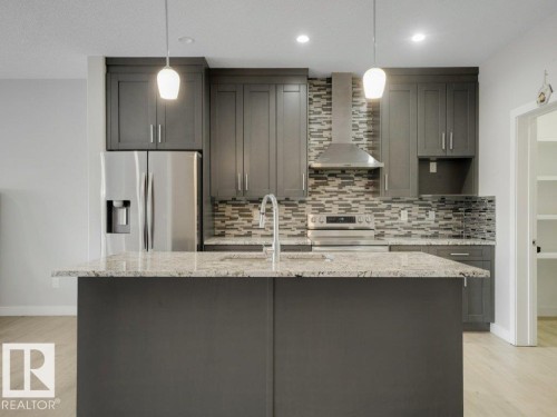 6412 167A Avenue, Edmonton, AB - Indoor Photo Showing Kitchen With Upgraded Kitchen