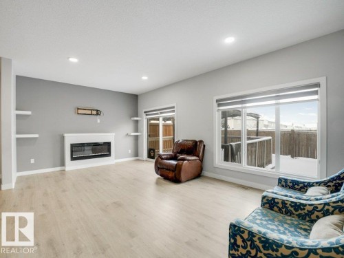 6412 167A Avenue, Edmonton, AB - Indoor Photo Showing Living Room With Fireplace