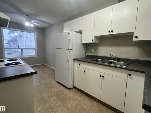 F-17 Imperial Crescent, Devon, AB - Indoor Photo Showing Kitchen With Double Sink