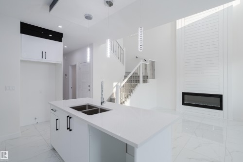 931 19 Avenue, Edmonton, AB - Indoor Photo Showing Kitchen With Double Sink
