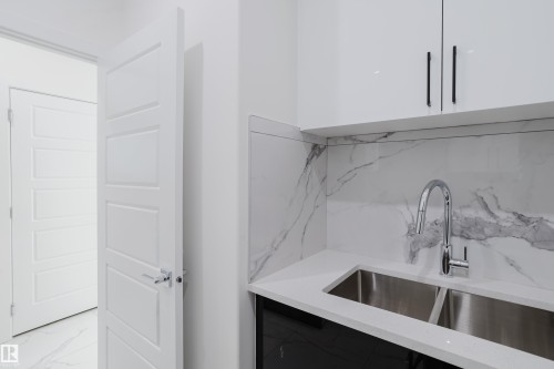 931 19 Avenue, Edmonton, AB - Indoor Photo Showing Kitchen With Double Sink