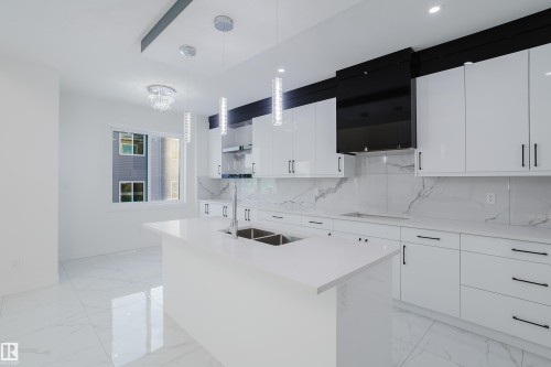 931 19 Avenue, Edmonton, AB - Indoor Photo Showing Kitchen With Double Sink