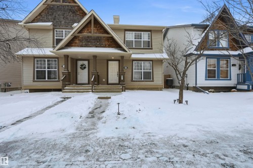 View of front of house featuring a chimney - 21017 60 Avenue, Edmonton, AB - Outdoor With Facade
