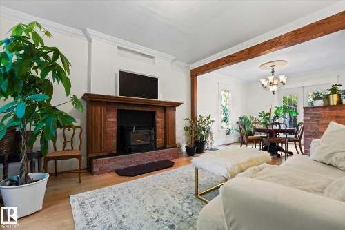 10838 126 Street, Edmonton, AB - Indoor Photo Showing Living Room With Fireplace
