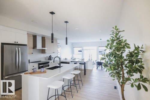 7477 Klapstein Crescent, Edmonton, AB - Indoor Photo Showing Kitchen With Double Sink