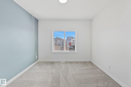 1558 Siskin Link Link, Edmonton, AB - Indoor Photo Showing Other Room