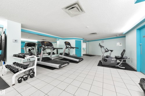 Exercise room featuring a textured ceiling - 601 13910 Stony Plain Road, Edmonton, AB - Indoor Photo Showing Gym Room