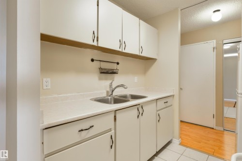 601 13910 Stony Plain Road, Edmonton, AB - Indoor Photo Showing Kitchen With Double Sink
