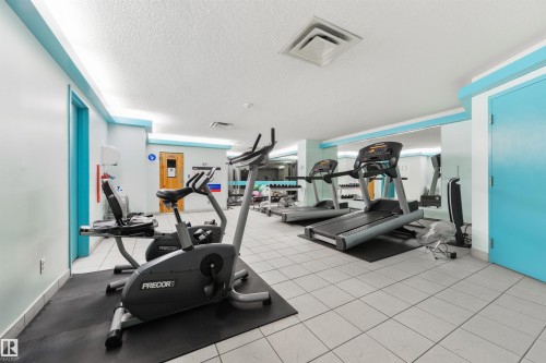 Workout area featuring a textured ceiling - 601 13910 Stony Plain Road, Edmonton, AB - Indoor Photo Showing Gym Room